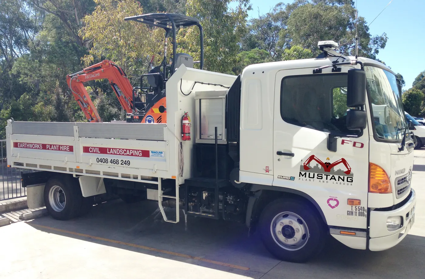 Mustang excavator and operator working on a Sydney site